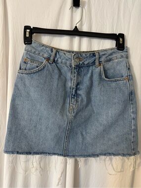 Topshop Moto, Light Blue Denim Mini Skirt Size 6 With Raw Hem.